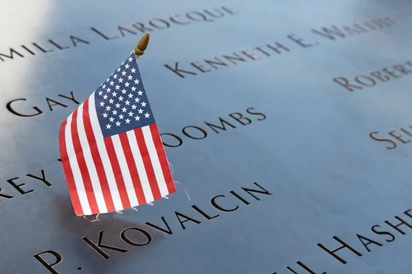 National September 11 Memorial names with USA flag in New York — Stock Photo, Image