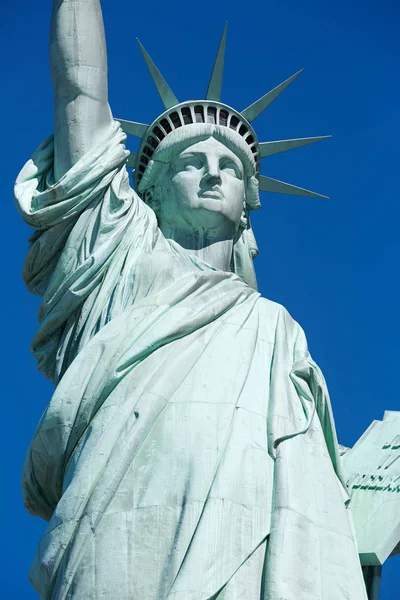 Statue of Liberty detail in a sunny day, blue sky — Stock Photo, Image