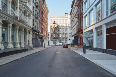 Soho empty street with cast iron buildings in New York clipart