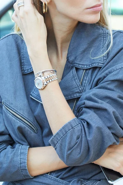Woman with Rolex Datejust watch and blue denim overalls before Luisa Beccaria fashion show, Milan Fashion Week street style — Stock Photo, Image