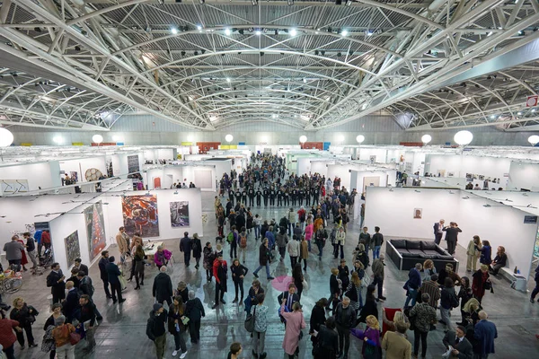 Artissima contemporary art fair open high angle view at Oval Lingotto Palace with visitors in Turin, Italy — стокове фото