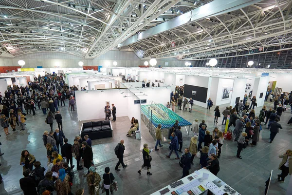 Artissima contemporary art fair open high angle view at Oval Lingotto Palace with visitors in Turin, Italy — стокове фото