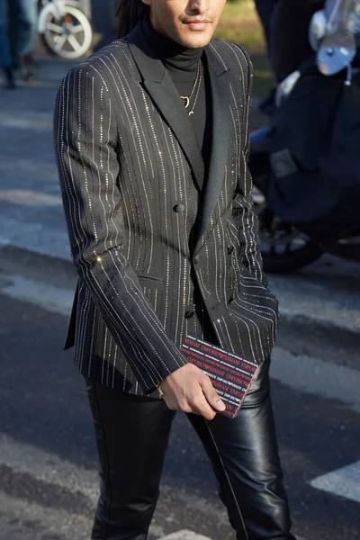 Man with black jacket striped with white gems and black turtleneck before Emporio Armani fashion show, Milan Fashion Week street style — 스톡 사진