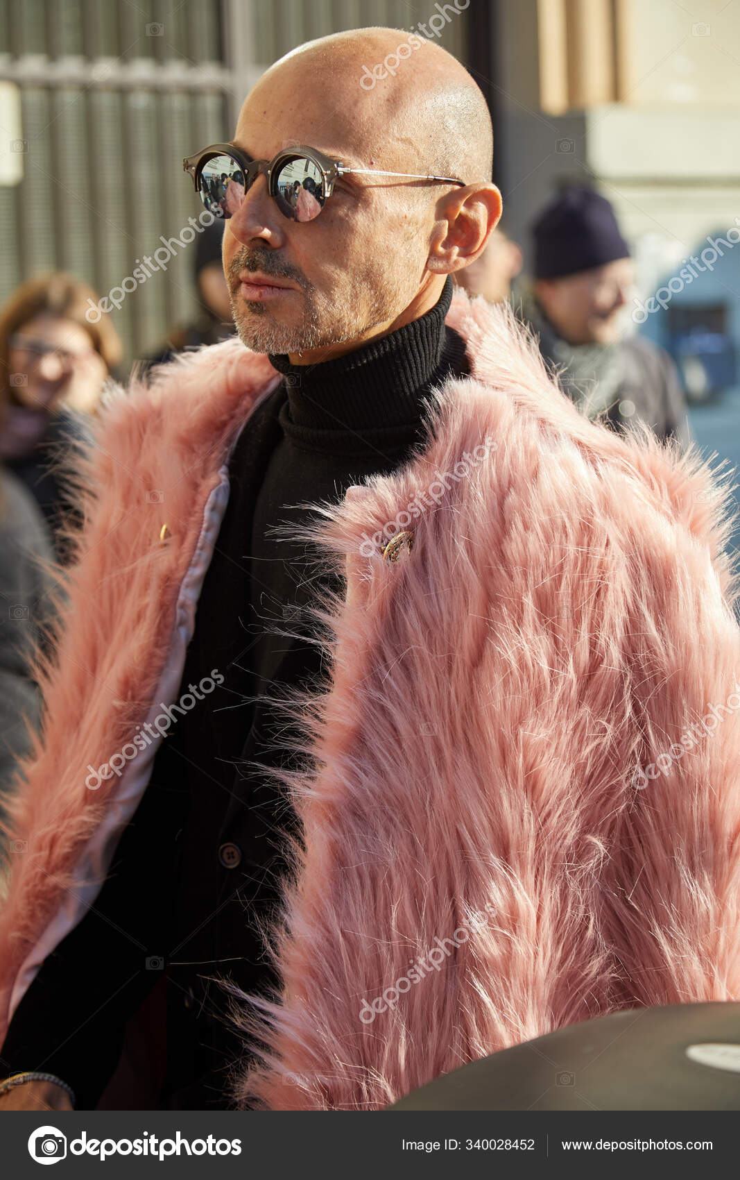 Enzo Miccio with pink fur coat before Msgm fashion show, Milan