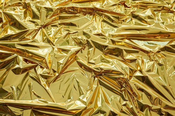 Crumpled Golden Metallic Foil Texture Background — Stock Photo, Image