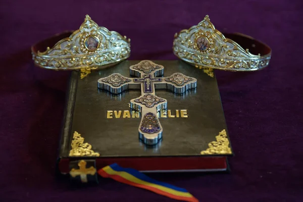 Ritual in preparation for a wedding ceremony in Orthodox religion including a holy book called \