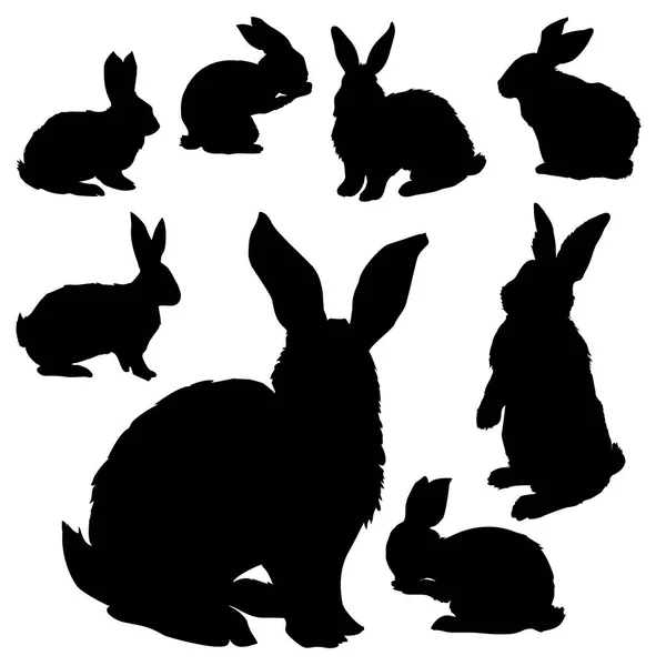 Siyah tavşan siluetleri kümesi — Stok Vektör