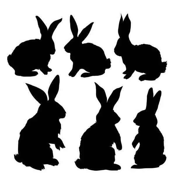 Set of Black rabbit silhouettes — Stock Vector