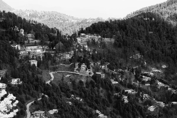 A black and white picture of the valley