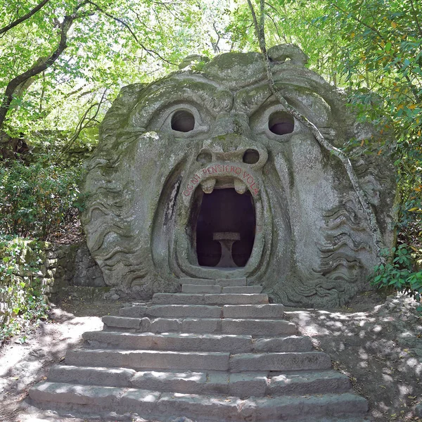 Orcus mouth sculpture at famous Parco dei Mostri (Park of the Monsters), also named Sacro Bosco (Sacred Grove) or Gardens of Bomarzo in Bomarzo, province of Viterbo, northern Lazio, Italy — Stock Photo, Image