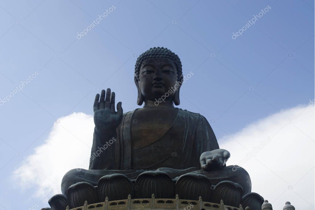 Giant Buddha sitting on lotusl. Hong Kong