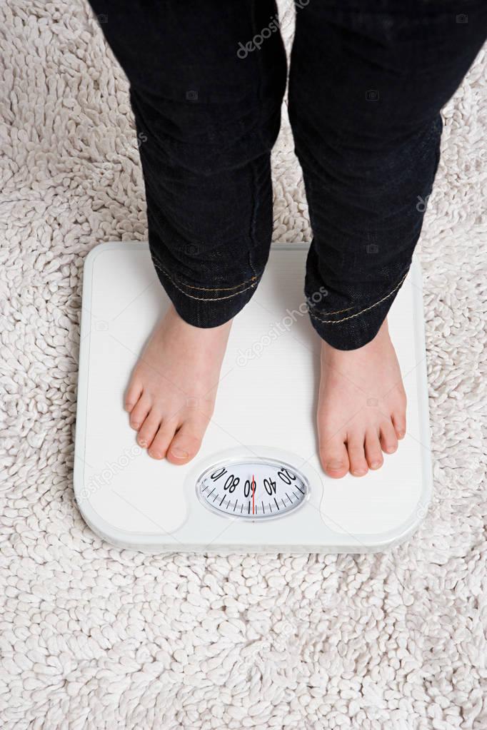 Child on weight scales