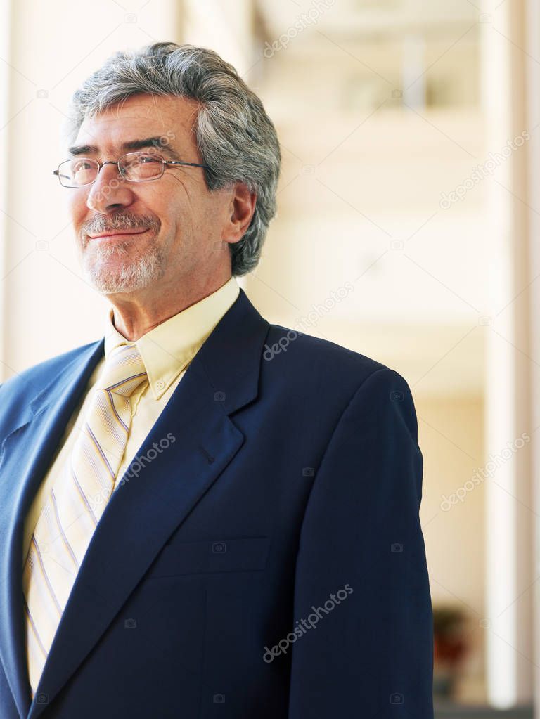 Senior businessman wearing glasses