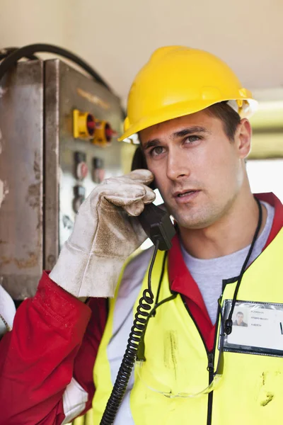 Worker talking on phone