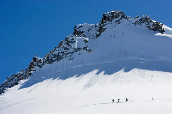 Sylwetki skiturowców — Zdjęcie stockowe