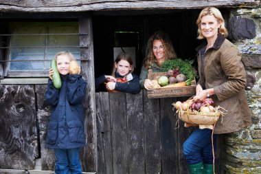 Family with fresh vegetables clipart