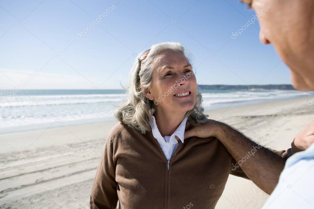 Senior woman holding to husband hand 