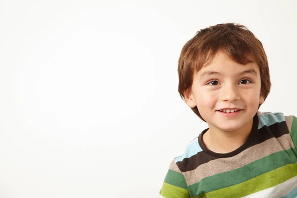 Young boy smiling on white — Stock Photo, Image