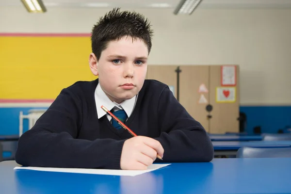 Boy in classroom, close-up — Stock Photo, Image