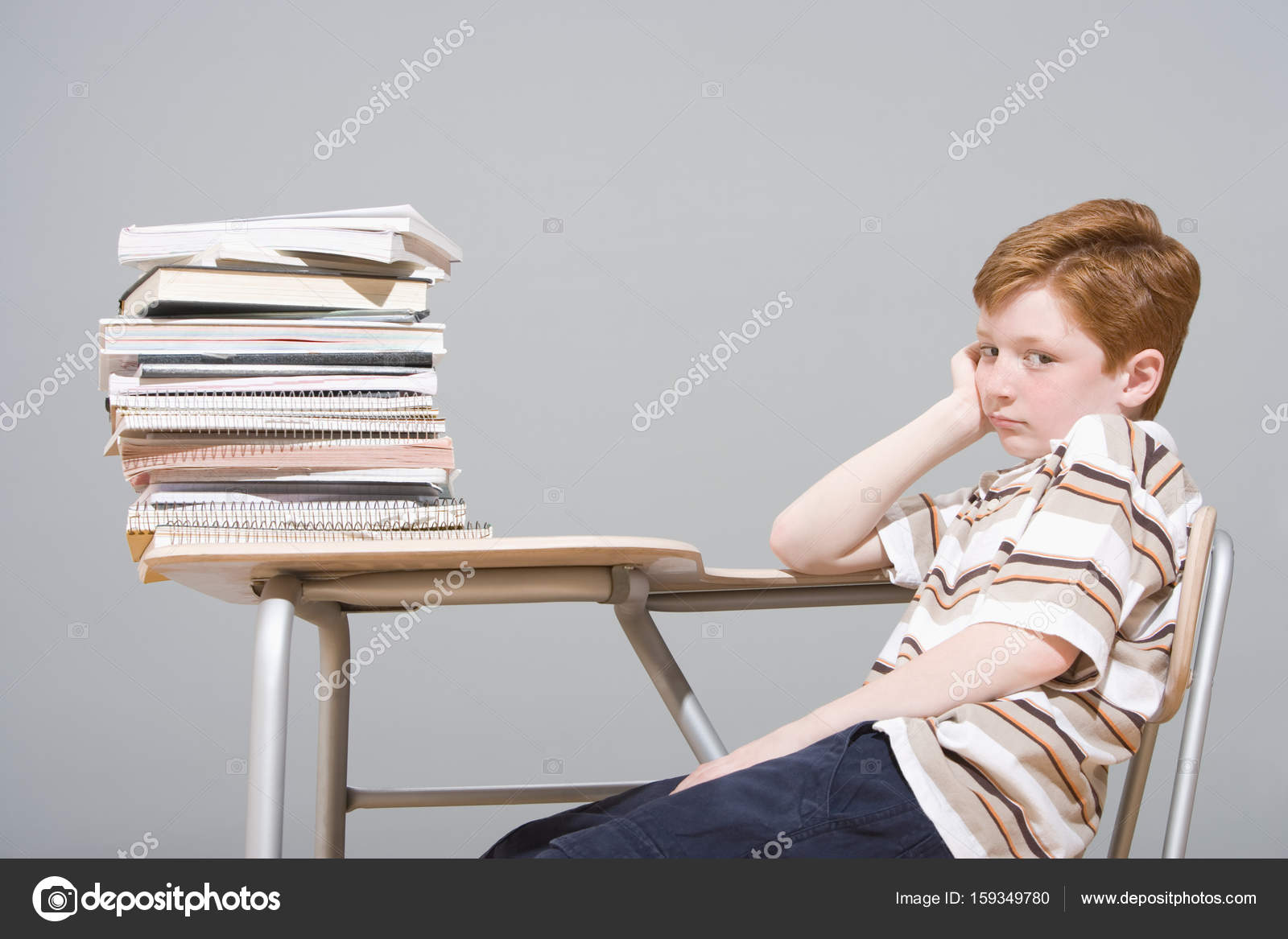 wallpapers Boy Sitting At Desk https depositphotos com 159349780 stock photo bored boy sitting at desk html
