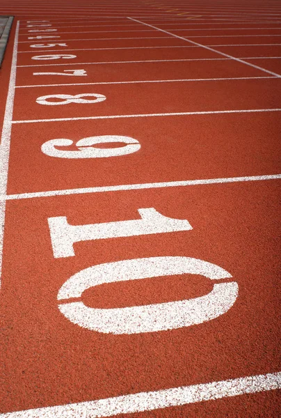Lane numbers on running track — Stock Photo, Image