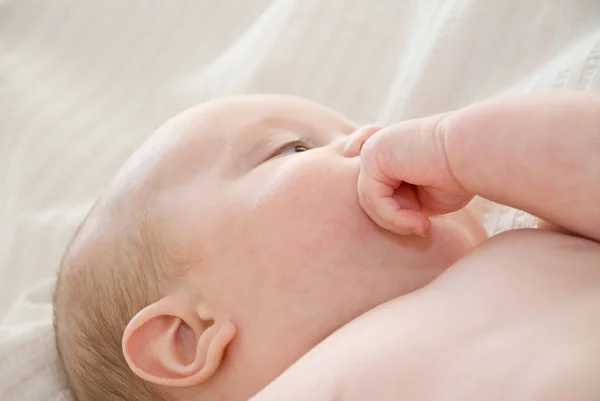 Portrait of baby boy looking aside — Stock Photo, Image