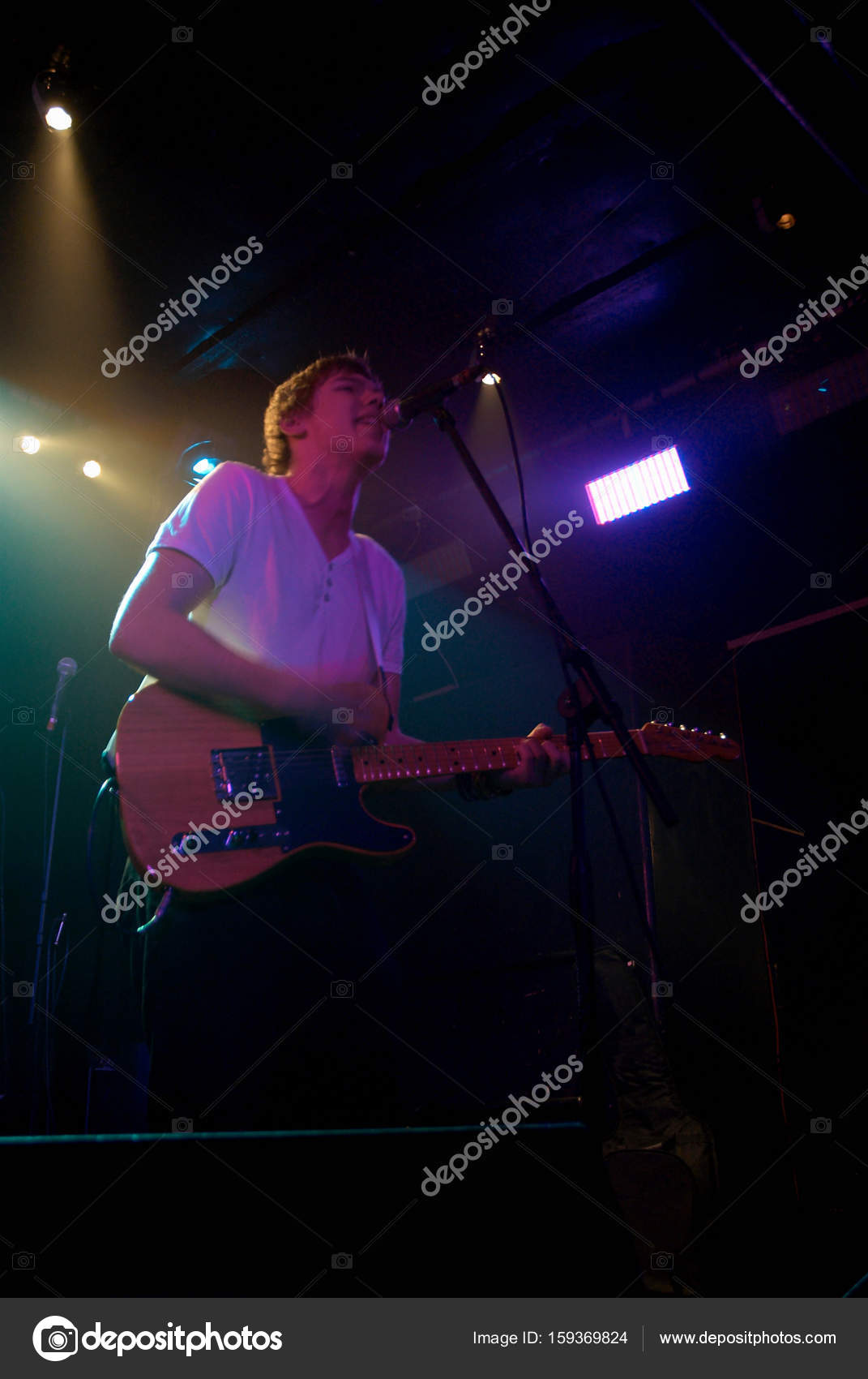 Lead Vocalist Guitar Stock Photo by ©ImageSource 159369824