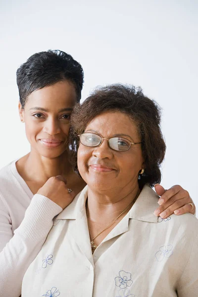 Madura mujer y hija —  Fotos de Stock