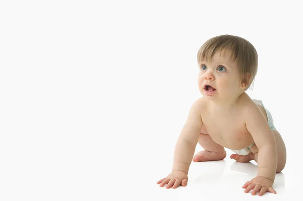 Baby crouching en opzoeken — Stockfoto