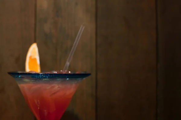 Cocktail glass with red drink — Stock Photo, Image