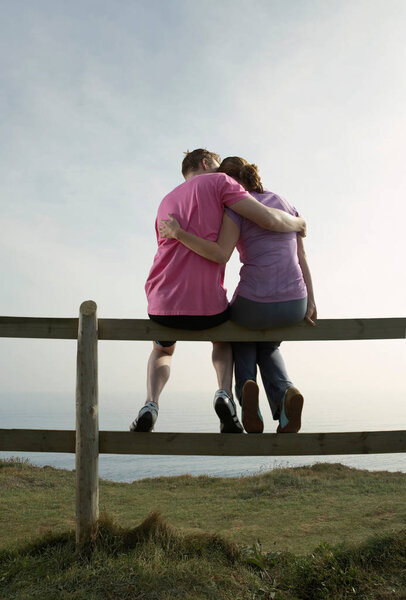 Couple Hug Sitting Country Fence Royalty Free Stock Images
