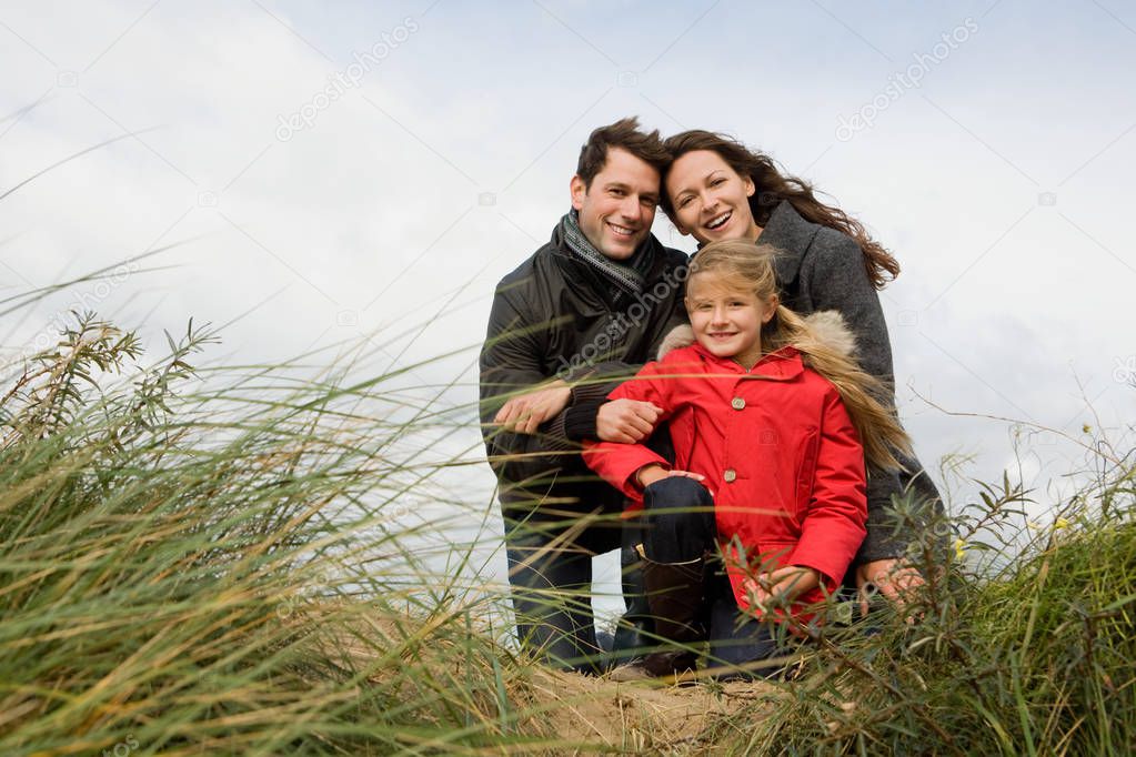 Family outdoors on beach