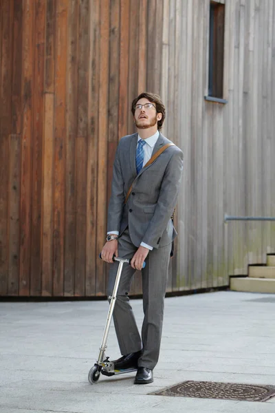 Businessman Riding Scooter Courtyard — Stock Photo, Image