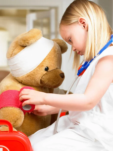 Girl Playing Doctor Teddy Bear — Stock Photo, Image