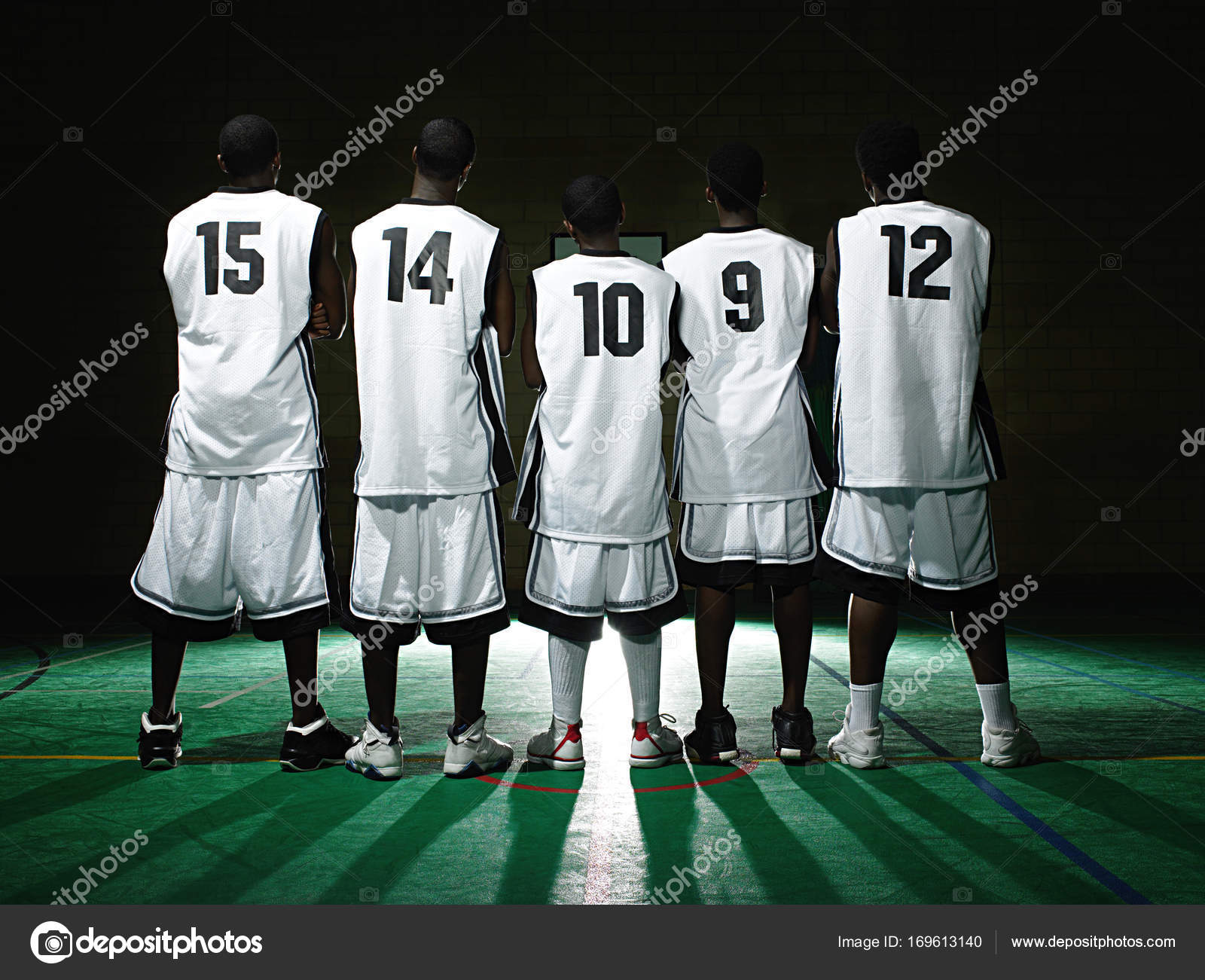 Rear View Basketball Team Stock Photo by ©ImageSource 169613140