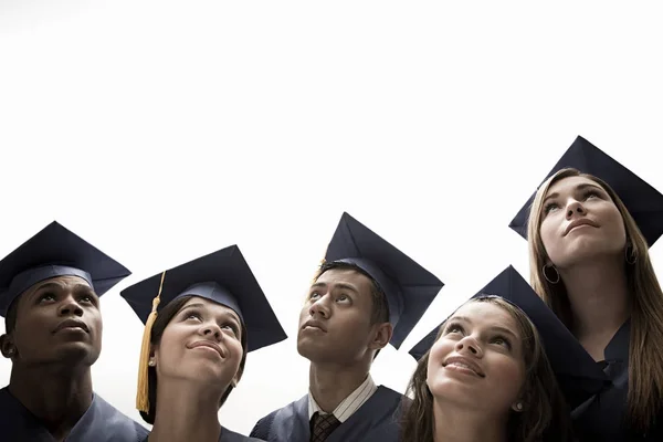 Graduados Aislados Sobre Fondo Blanco — Foto de Stock