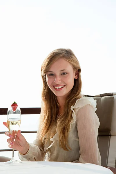 Young Woman Holding Champagne Flute Portrait — Stock Photo, Image