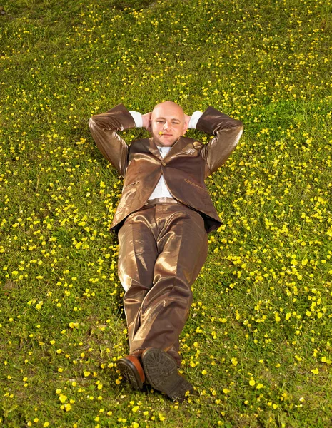 Man Lying Grass Gold Suit — Stock Photo, Image