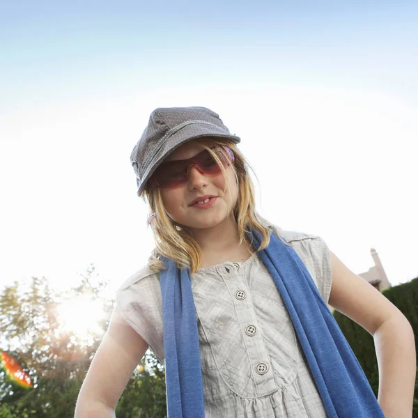 Young Girl Wearing Sunglasses Smiling Stock Photo