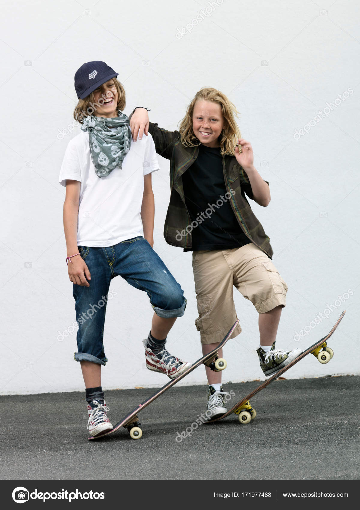 Two Boys Skateboards — Stock Photo © ImageSource #171977488