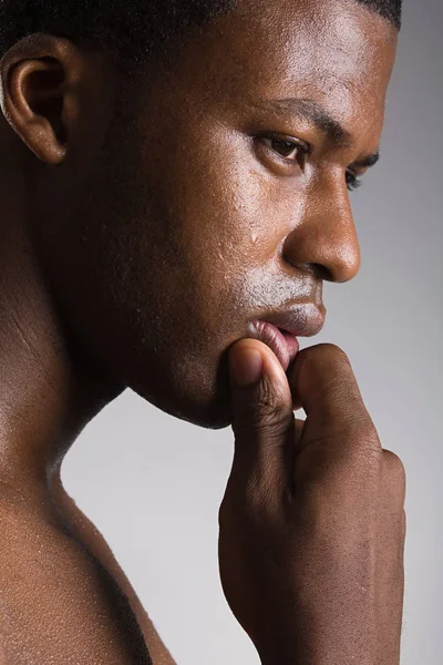 Portrait of a African man thinking