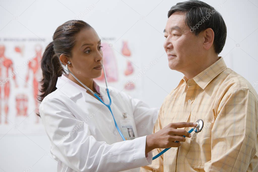 A doctor examining a patient