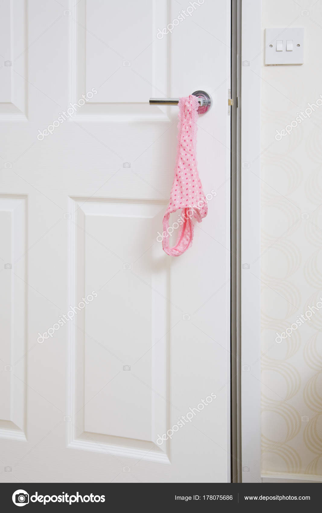 Red Knickers Hanging Off a Bedroom Door Handle Stock Photo - Image of  knickers, vertical: 82660126
