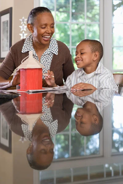 Grandmother Grandson Painting Birdhouse — Stock Photo, Image