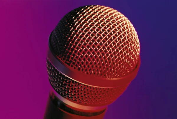 Retro microphone on dark — Stock Photo, Image