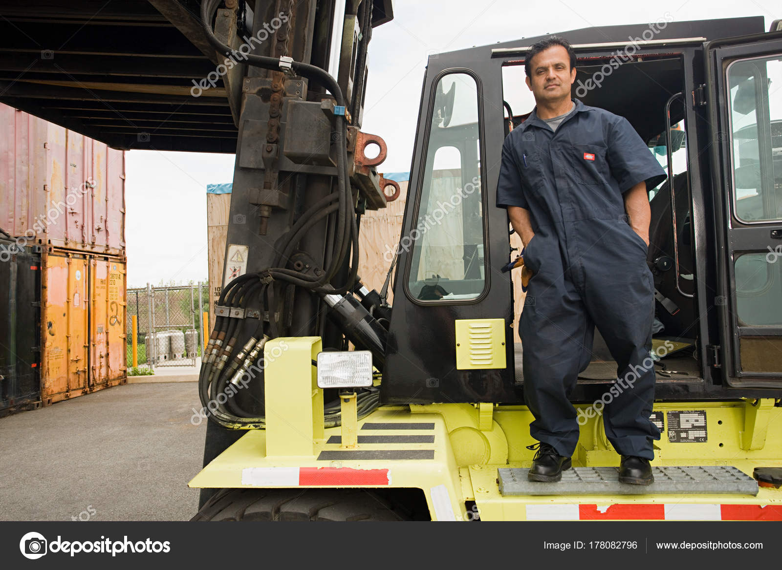 Worker Standing Forklift Truck Stock Editorial Photo C Imagesource 178082796