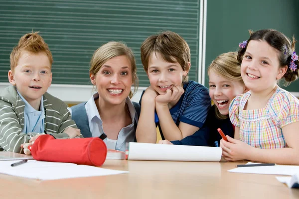 Teacher Pupils Smiling Camera Classroom — Stock Photo, Image