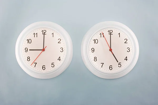 Two Clocks Hanging Wall — Stock Photo, Image