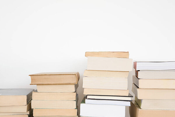 Close-up of stacks of books on table