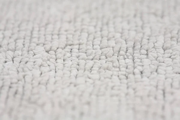 カーペットの白い毛皮で覆われた布 — ストック写真